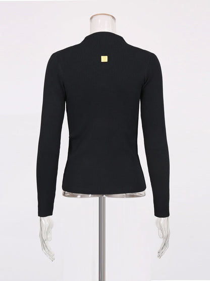 Black Ribbed Sweater with Gold Keyhole Embellishment