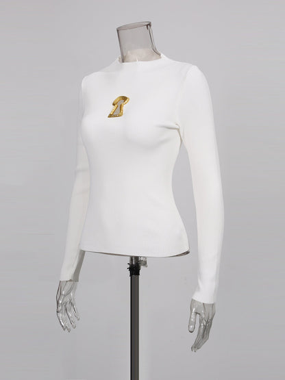 White Ribbed Knit Sweater with Gold Embellishment